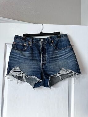 Levi's Distressed Dark Blue Denim Cutoff Shorts